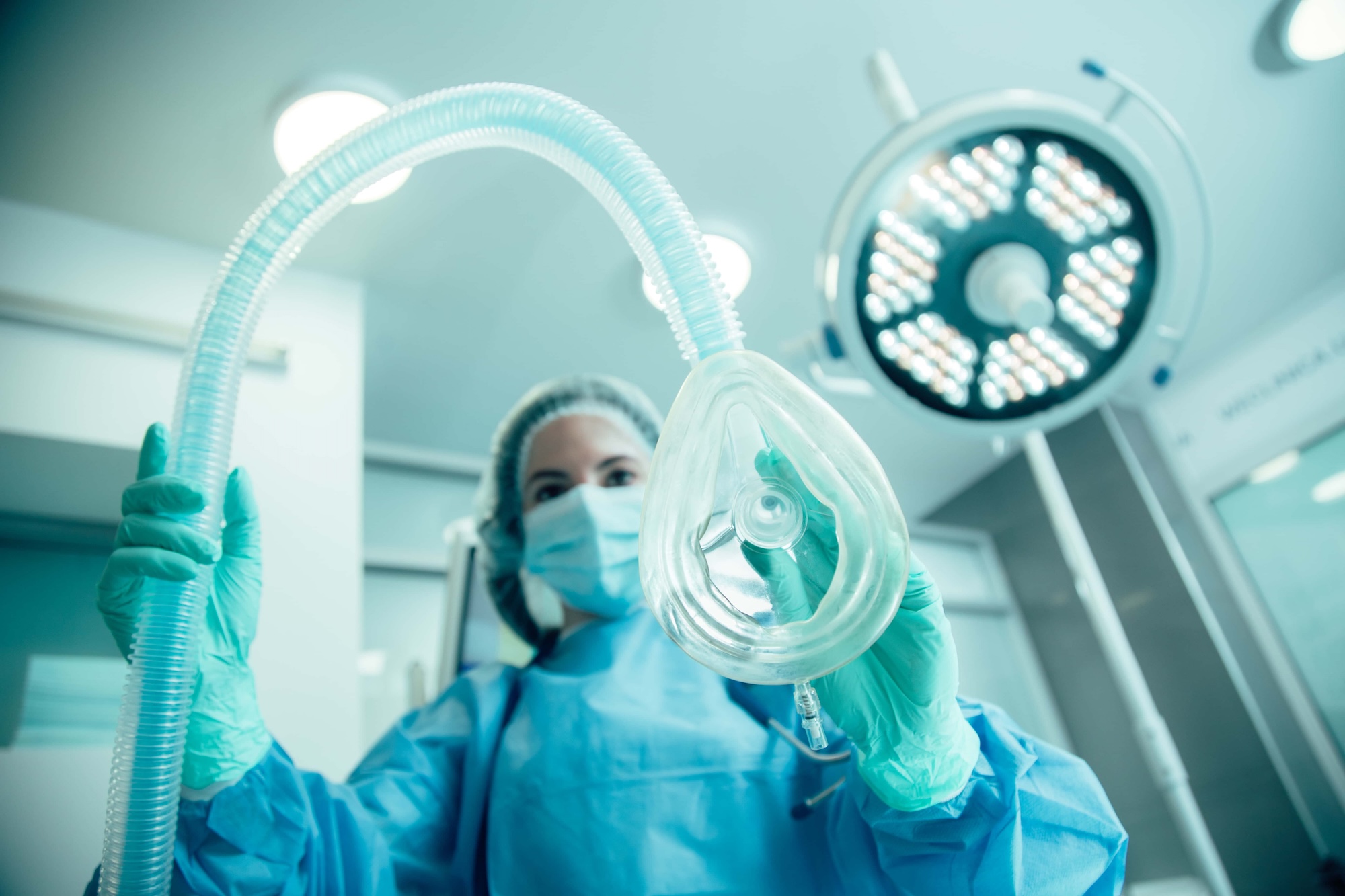 Anesthesia mask in hands of medical worker in clinic