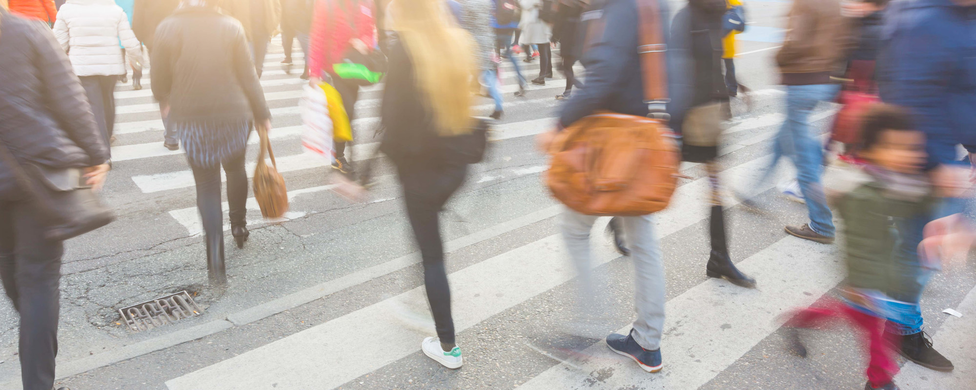 blurred crowd of people walking on zebra crossin in copenhagen