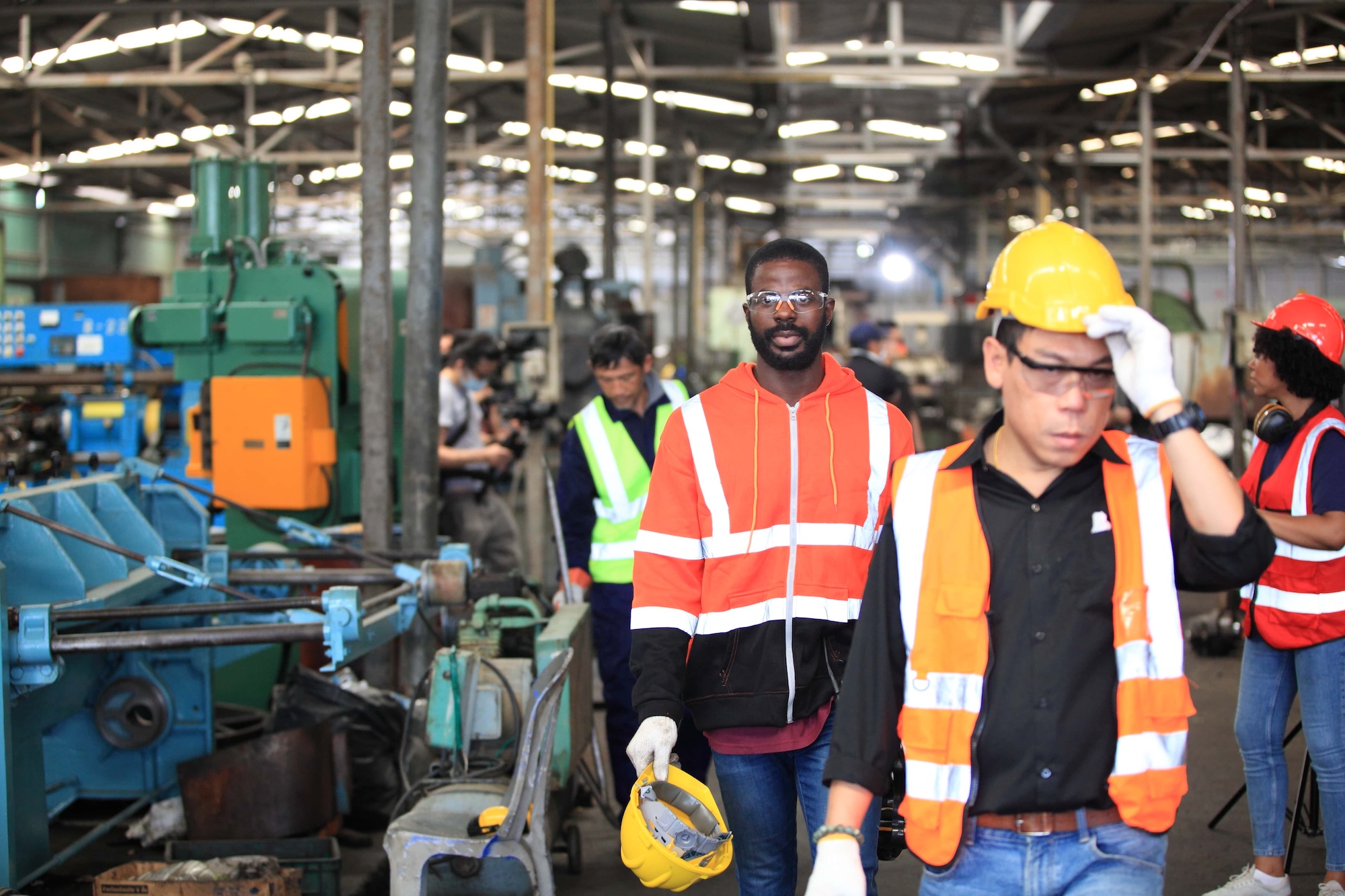 engineer team finished work and walking go out of factory